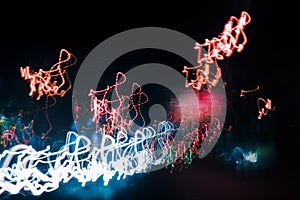 Abstract background blurred colored marks from fast moving cars night