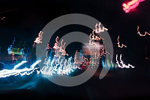 Abstract background blurred colored marks from fast moving cars night