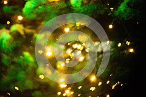 Abstract background with blurred golden lights. Glowing effect. Gold bokeh of light textured glitter background. Christmas party ,