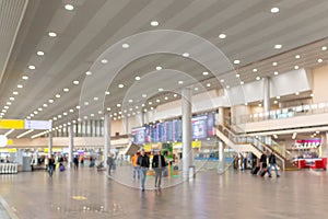 Abstract background. Blurred image of aeroport interior. Out of focus photo of high-tech building