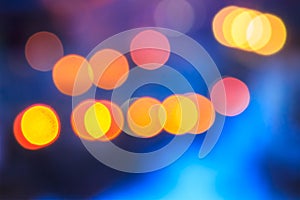 Abstract background of blurred lights with bokeh effect