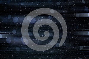 Abstract background of blurred motion drop light on the dark background.