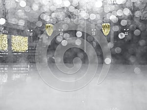 Abstract background of blurred ultimate grey lights with bokeh effect