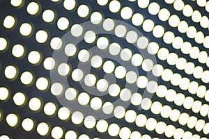 Abstract background of blurry lighting lamps.