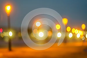 Abstract background with bokeh from light of night lights, car headlights, evening lights of city