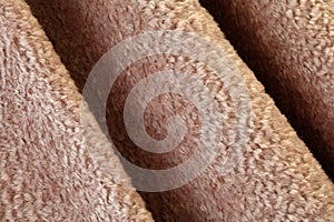 Abstract background of brown. Abstract texture of fabric or textile material of brown color