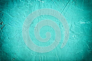 Abstract background bumpy putty. Beautiful turquoise color, empty space with vignette.