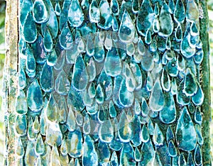 Abstract background, ceramic glazed surface in the form of water drops, raindrops, blue cyan, texture structure background