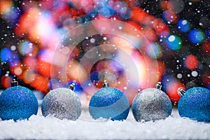 Abstract background, Christmas toys on a boke background. Happy New Year, with falling snow, bright background