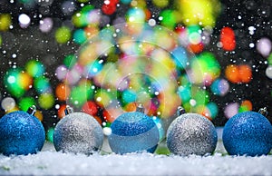 Abstract background, Christmas toys on a boke background. Happy New Year, with falling snow, bright background