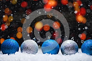 Abstract background, Christmas toys on a boke background. Happy New Year, with falling snow, bright background