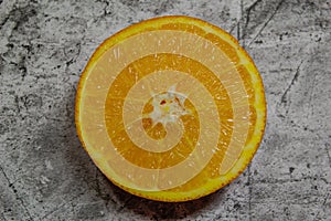 Abstract background with citrus-fruit of orange slices. Close-up. Studio photography