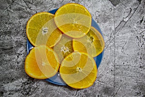 Abstract background with citrus-fruit of orange slices. Close-up. Studio photography