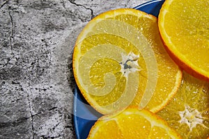 Abstract background with citrus-fruit of orange slices. Close-up. Studio photography