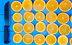 Abstract background with citrus-fruit of orange slices. Close-up. Studio photography.