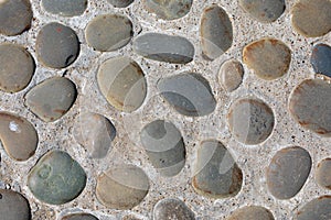 Abstract background of cobblestone pavement close-up. Top view on stone road close up. High resolution photo. Mock up