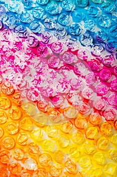 abstract background of colored bubble wrap painted