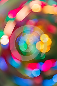 Abstract background of colorful bokeh from neon lights. spin radial motion