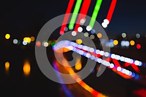 Abstract  background of colorful city lights at night. Blurry backdrop