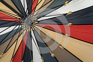 Abstract background of colorful dome of the umbrella on the inside with spokes