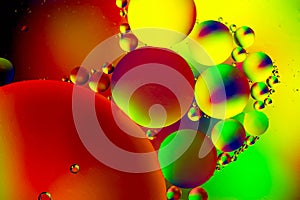 Abstract background with colorful gradient colors. Oil drops in water abstract psychedelic pattern image. Water bubbles abstract