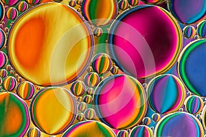 Abstract background of colorful oil drops on water