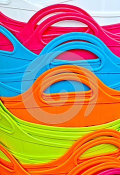 Abstract background of colorful plastic baskets