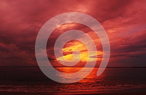 Abstract background colors fire in the sky summer sunset over sea