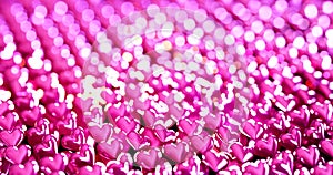 Abstract background consist of row of heart glossy pink loop motion.