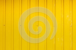 Abstract background corrugated gray metal for wall, yellow paint