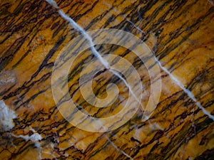 Abstract background, creative texture of marble and gold foil, decorative marbling, artificial fashionable stone