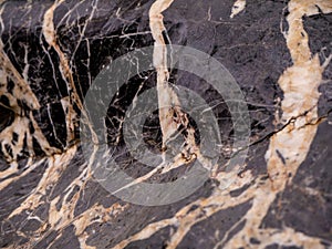 Abstract background, creative texture of marble and gold foil, decorative marbling, artificial fashionable stone