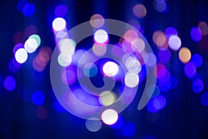 Abstract background with defocused bokeh colorful lights