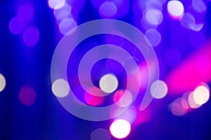 Abstract background with defocused bokeh colorful lights