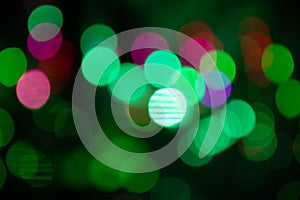 Abstract background with defocused bokeh colorful lights