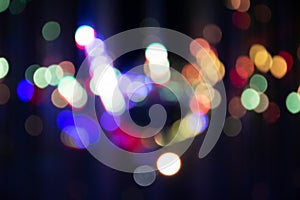 Abstract background with defocused bokeh colorful lights