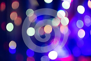 Abstract background with defocused bokeh colorful lights