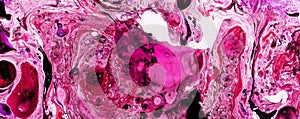 Abstract background of different shades of pink and magenta. Marble texture.