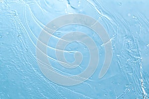 Abstract background. Drops of water on the window. water pours on a piece of clear glass