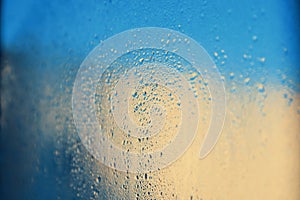 Abstract background. Drops on window glass.