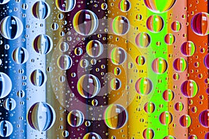 Abstract background with drops and wooden pencils set