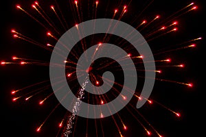 Abstract Background: Expanding Fuzzy Red/Pink Fireworks with Trail