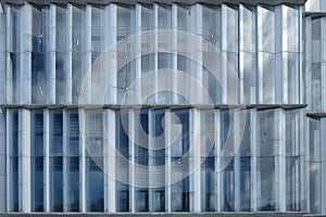Abstract background with exterior glass building facade in Paris