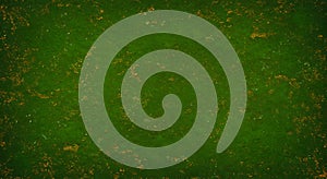 Dark green textured grunge background with gold specks