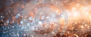 An abstract background featuring a glistening bokeh effect with shimmering particles and glittering lights