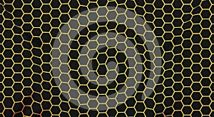 Golden honeycomb hexagonal grid pattern on a dark background