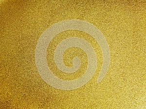 Abstract background of fine yellow gold dust