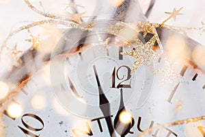 Abstract background with fireworks and clock close to midnight. Christmas and happy new years eve background