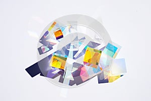 Abstract background with glass geometric figures prisms with light diffraction of spectrum colors and complex reflection