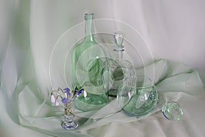Abstract background of glass objects, bottles and vases